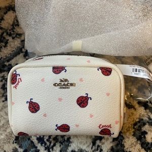 Coach NWT mini ladybug cosmetic bag.